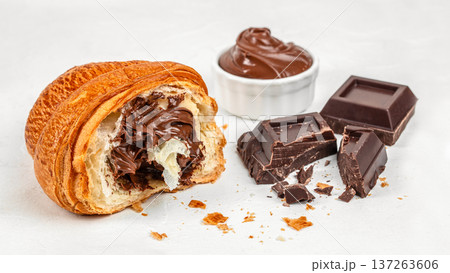 Chocolate Filled Croissant with Dark Chocolate Pieces and Cream 137263606
