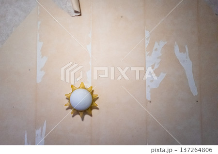 lamp on wall stripped of wallpaper lamp on wall stripped of wallpaper 137264806