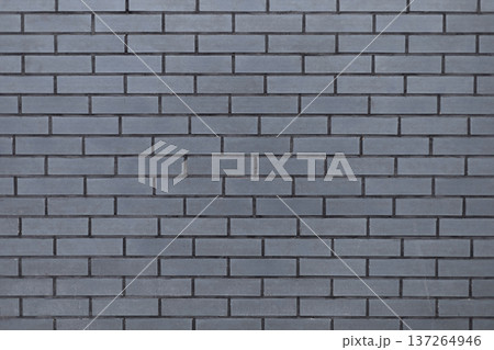 Grey wall texture imitating brickwork pattern, neutral background for design projects Grey wall texture imitating brickwork pattern, neutral background for design projects 137264946