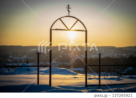 Orthodox Cross at Sunset: Winter Landscape 137265921