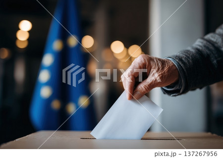 Voter's Hand Casting Ballot with EU Flag in Background, Civic Documentary Style 137267956