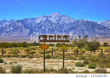 Manzanar Sign With Eastern Sierra Mountains And Arid California Landscape Manzanar Sign With Eastern Sierra Mountains And Arid California Landscape 137268197