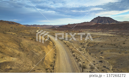 Aerial Desert Road and Lava Butte Near Las Vegas Nevada at Sunset Aerial Desert Road and Lava Butte Near Las Vegas Nevada at Sunset 137268272