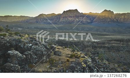 Aerial Golden Hour Red Rock Canyon Mountain Range and Desert Landscape 137268276