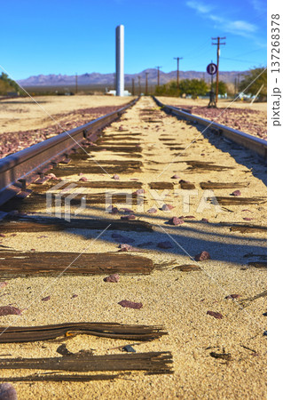 Desert Train Tracks and Weathered Railroad Ties in Mojave California 137268378