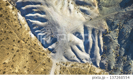 Aerial Nevada Desert Eroded Hills and Rugged Landscape Top Down Aerial Nevada Desert Eroded Hills and Rugged Landscape Top Down 137268554