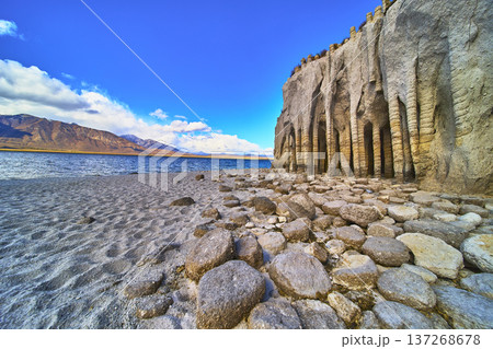 Crowley Lake Stone Columns Shoreline and Sierra Nevada Mountains Under Blue Sky 137268678