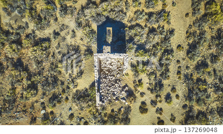 Aerial Abandoned Stone Structure Desert Landscape and Shrubs Top Down 137269048