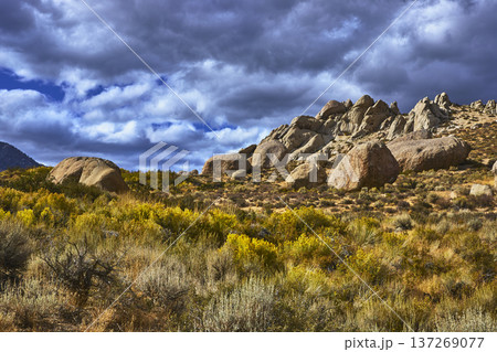 Buttermilk Boulders and Dramatic Clouds Over Eastern Sierra Landscape California Buttermilk Boulders and Dramatic Clouds Over Eastern Sierra Landscape California 137269077