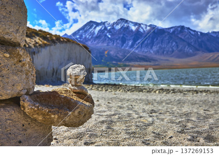 Cairn and Crowley Lake Stone Columns with Snowy Sierra Mountains and Lake 137269153