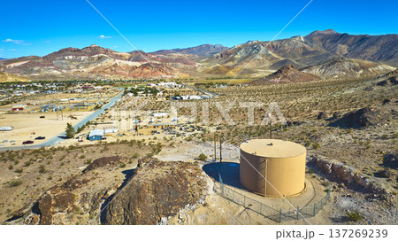 Aerial Water Tank Desert Town and Mountain Landscape Nevada 137269239