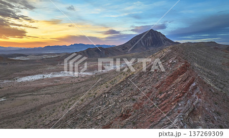 Aerial Lava Butte Sunrise Over Rugged Mountain Landscape Nevada Desert Aerial Lava Butte Sunrise Over Rugged Mountain Landscape Nevada Desert 137269309