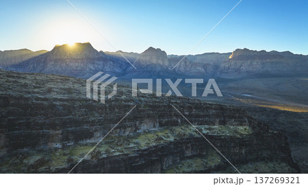 Aerial Golden Hour Over Cowboy Canyon and Red Rock Mountain Range Nevada 137269321
