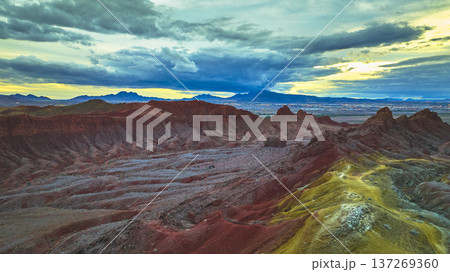 Aerial Lava Butte Rugged Red Rock Formations and Las Vegas Skyline at Sunset Aerial Lava Butte Rugged Red Rock Formations and Las Vegas Skyline at Sunset 137269360