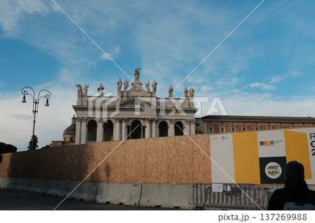 Archbasilica of Saint John Lateran facade and Lateran district with piazza palace and Porta San Giovanni ancient walls Rome Italy exterior architecture landmark. High quality photo Archbasilica of Saint John Lateran facade and Lateran district with piazza palace and Porta San Giovanni ancient walls Rome Italy exterior architecture landmark. High quality photo 137269988