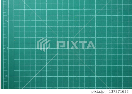 green cutting mat board on white background with line and scale measure guide pattern for object art design, tool equipment of diy craft work 137271635