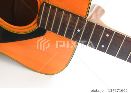 brown wood acoustic guitar isolated on white background 137271662