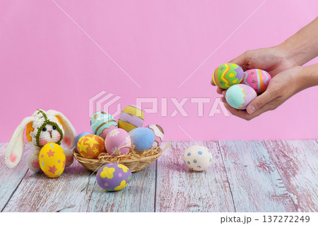 Easter bunny with colorful eggs in a cheerful atmosphere 137272249
