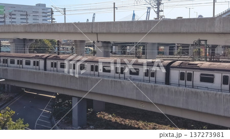 Lai King MTR Train Travels Along Elevated Railway Feb 16 2026 137273981