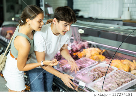 couple carefully selects their choice 137274181