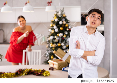 Quarrel of wife and husband during christmas celebration 137274925