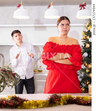 Quarrel of wife and husband at Christmas celebration in home 137274944