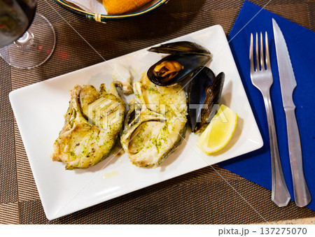 Hake medallions with mussels seafood platter Hake medallions with mussels seafood platter 137275070