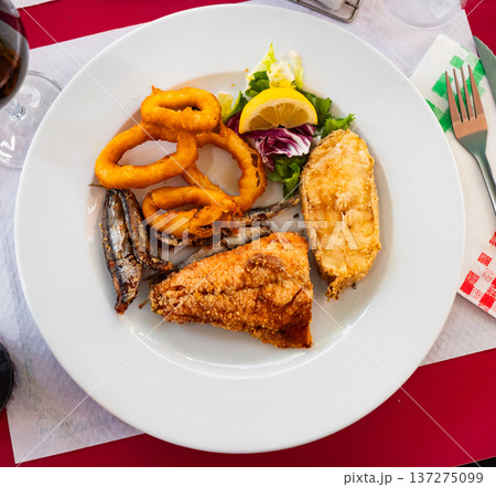 Grilled seafood and fish are specialty at coastal restaurant Grilled seafood and fish are specialty at coastal restaurant 137275099