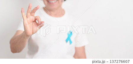 Elderly with blue Ribbon for Prostate Cancer Awareness month, April Child Abuse Prevention, National Bullying, September Addiction Recovery, May Chronic Fatigue Syndrome and January Human Trafficking Elderly with blue Ribbon for Prostate Cancer Awareness month, April Child Abuse Prevention, National Bullying, September Addiction Recovery, May Chronic Fatigue Syndrome and January Human Trafficking 137276607