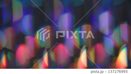 Defocused glow. Light flare. Purple orange neon color optical gleam round rainbow visual luminous glint on abstract art bokeh background. Defocused glow. Light flare. Purple orange neon color optical gleam round rainbow visual luminous glint on abstract art bokeh background. 137276993