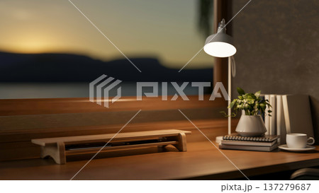 Wooden stand with book plant and coffee on wooden table under lamp light and morning sky over window Wooden stand with book plant and coffee on wooden table under lamp light and morning sky over window 137279687