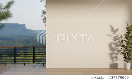 Potted houseplant on wooden parquet floor corridor and balcony terrace's railing with forest scenery 137279699