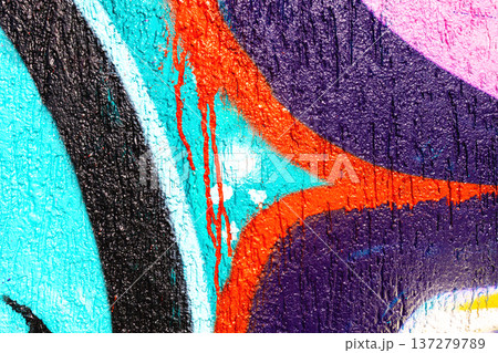 Vibrant Urban Graffiti Wall Featuring Turquoise, Orange, Purple with 90s, Y2K Street Art Style 137279789