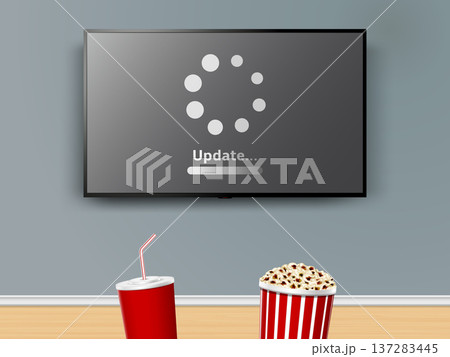 Update progress on tv screen. Watching tv with soda cup and popcorn box. Update progress on tv screen. Watching tv with soda cup and popcorn box. 137283445