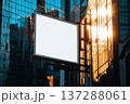 Massive Blank White Billboard on Glass Building in Urban Environment at Sunset 137288061