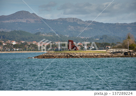 Rusty iron monument,Encounter Between Two Worlds, next to Santa Marta beach in Baiona, Galicia 137289224