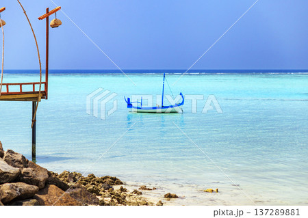 Calm blue waters stretch to distant horizon Calm blue waters stretch to distant horizon 137289881