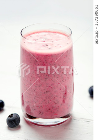Two glasses of berry smoothie with chia and fresh berries 137290661