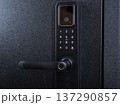 Modern smart door lock with digital keypad and biometric fingerprint access. 137290857