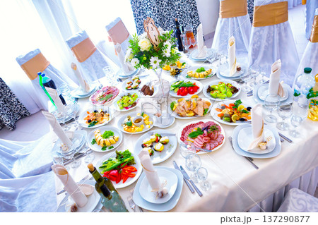 meal at the banquet. good cuts of meat, cheese. the holiday table 137290877