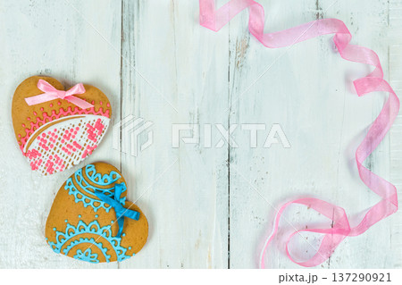 Heart shaped cookies for valentine day on wooden table. Top view, copy space Heart shaped cookies for valentine day on wooden table. Top view, copy space 137290921