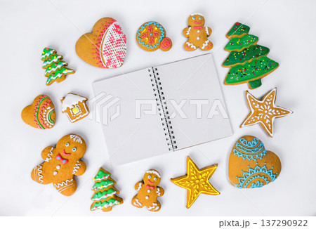 Christmas homemade gingerbread cookies on a white background. Christmas homemade gingerbread cookies on a white background. 137290922