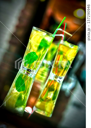 Glasses of cocktails on bar background Glasses of cocktails on bar background 137290946