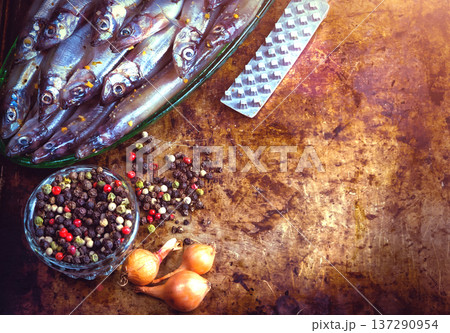 Fresh fish top view. Spicy herb and vegetables. Spice on wooden board. Healthy food cooking. 137290954
