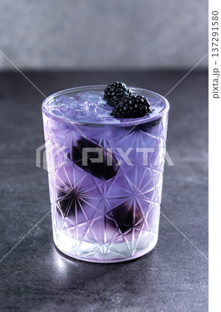 Bramble cocktail with blackberries and crushed Ice. Bramble cocktail with blackberries and crushed Ice. 137291580