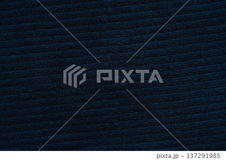 Dark navy ribbed fabric texture background, close up textile surface with copy space Dark navy ribbed fabric texture background, close up textile surface with copy space 137291985