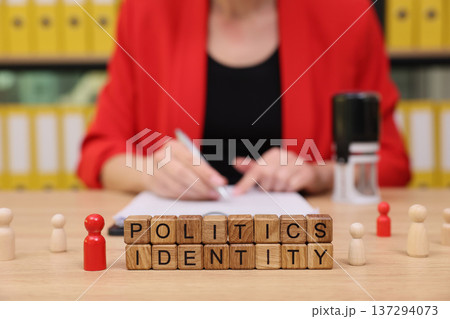 Exploring the intersection of politics and personal identity in a creative office setting during a brainstorming session Exploring the intersection of politics and personal identity in a creative office setting during a brainstorming session 137294073