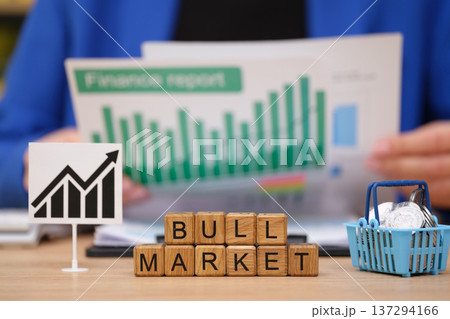 Exploring the dynamics of a bull market through financial reports and strategic insights in a modern workspace 137294166