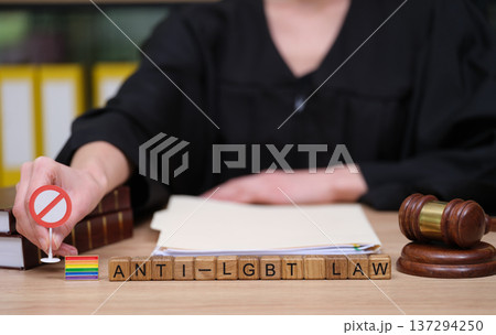 Courtroom scene highlights the struggle against anti-LGBT laws through powerful symbols of justice and equality during a legal proceeding 137294250