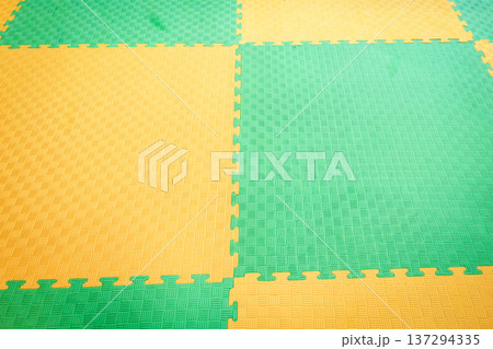 Interlocking EVA Foam Mats Form Modular Flooring Pattern 137294335